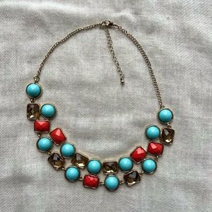 Gold plated necklace with blue and red stones